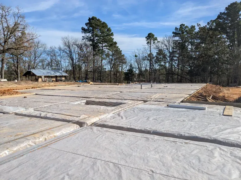 Foundation vapor barrier installation at commercial site