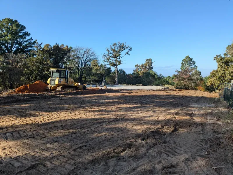 Bulldozer clearing commercial building site