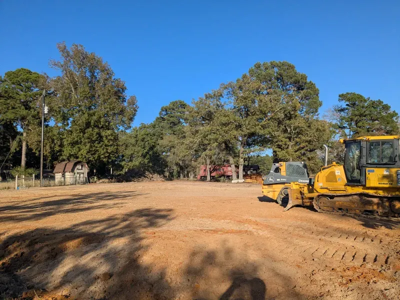 Site-clearing equipment on future commercial lot