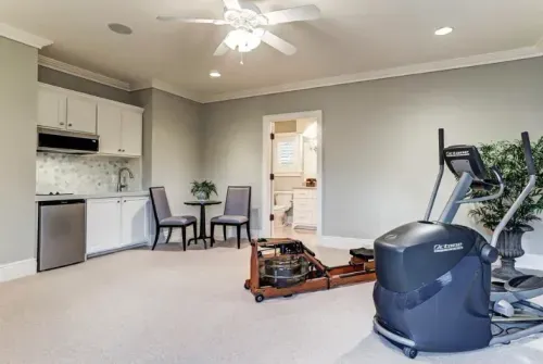 Bonus room with kitchenette and exercise equipment