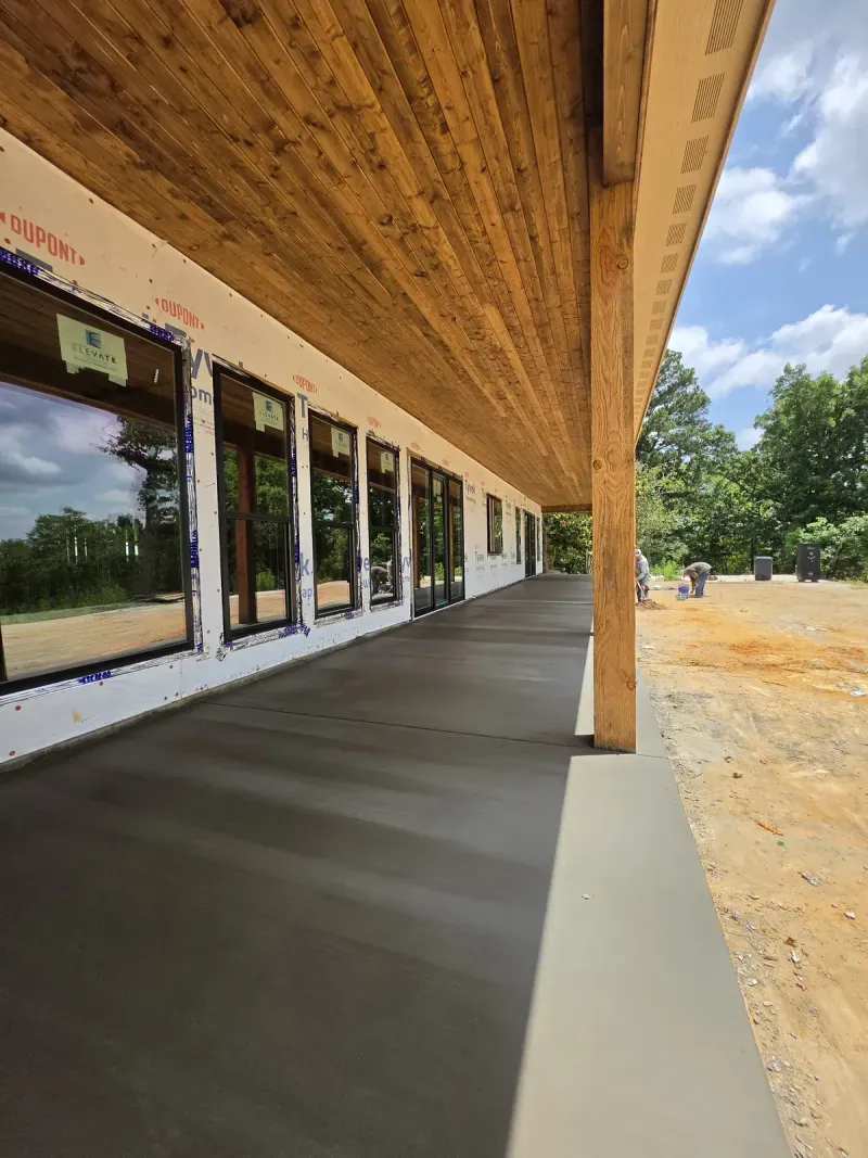 Covered porch with cedar ceiling under construction