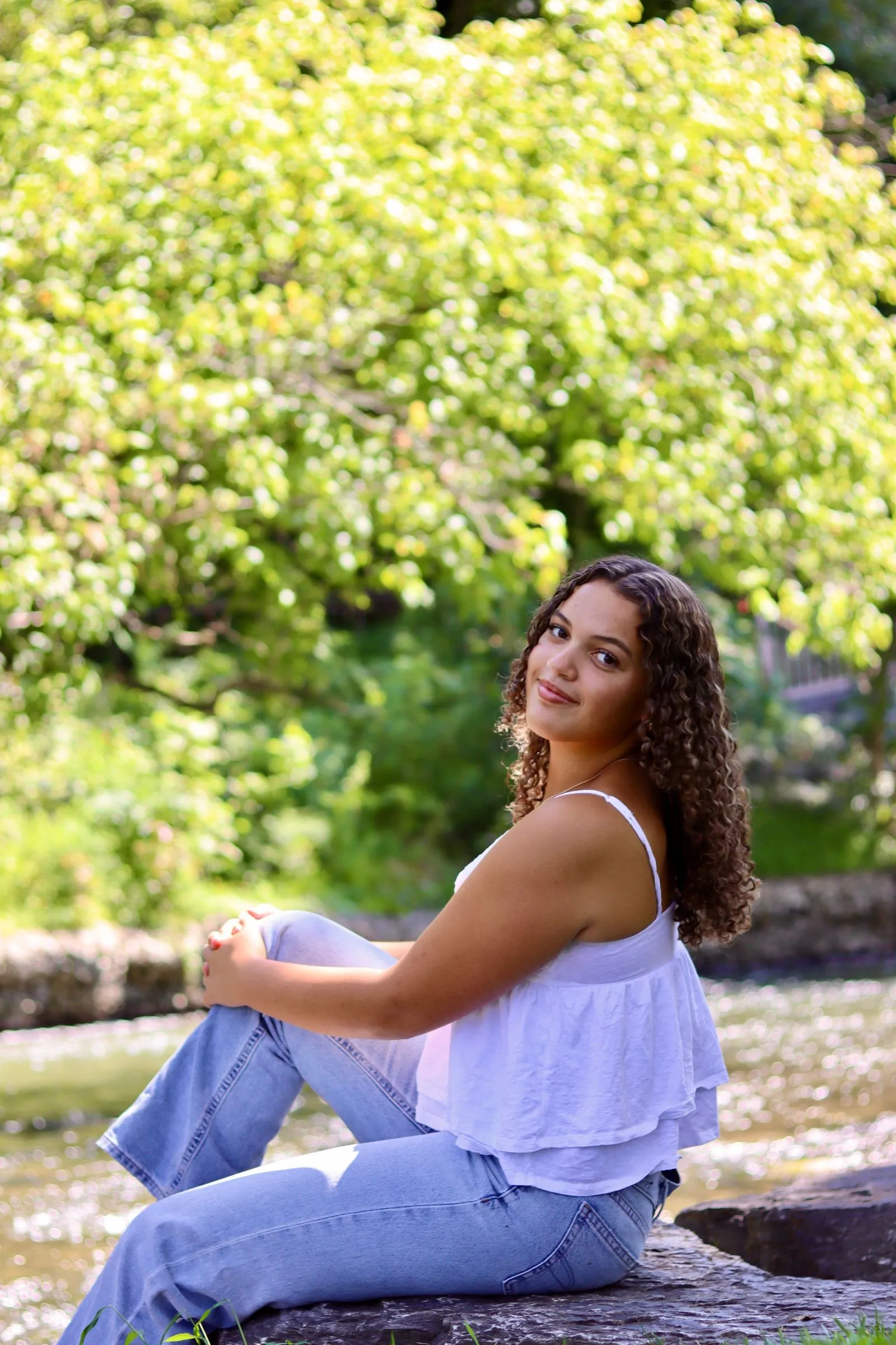 Outdoor portrait by the water photographed by CarlyArchive