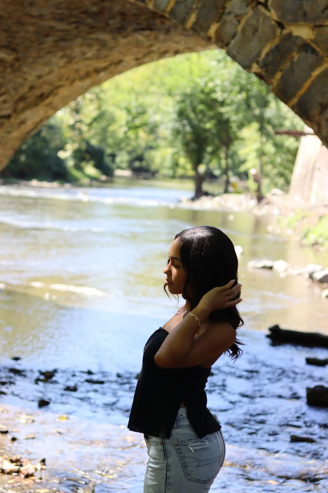 Lifestyle portrait by the water photographed by CarlyArchive