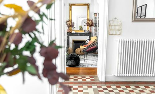 The passage from the dining room to the lounge, with its chequered floor