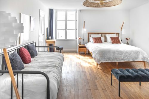 The second large bedroom, with a sofa bed facing the double bed
