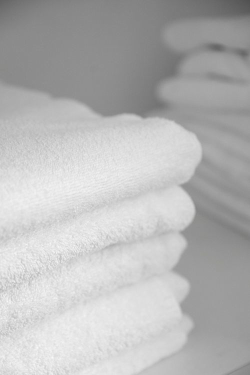 White towels folded and ready for your stay