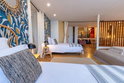 La Chambrée’s sleeping area looking towards the lounge and wooden screen