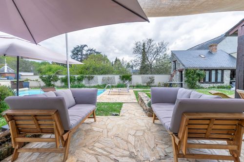 Terrace armchairs overlooking the garden