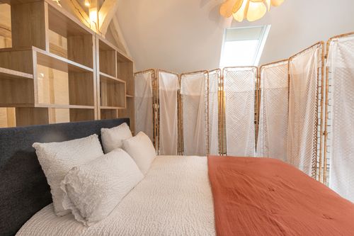 An upstairs sleeping area