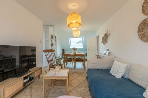 The lounge and corner sofa opening onto the dining area