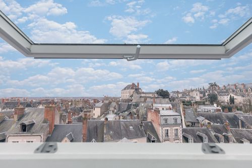 The view over Blois through the open roof window