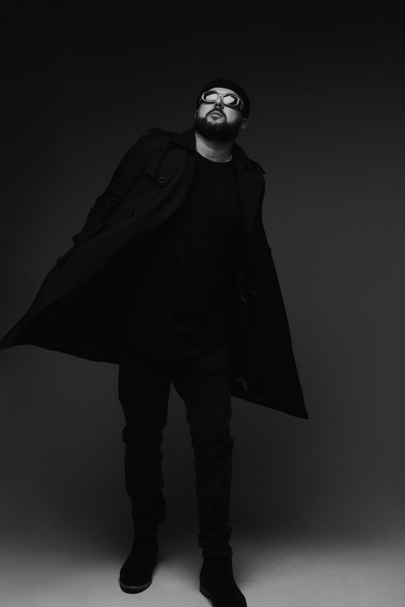 FERREIRA standing in a black editorial look