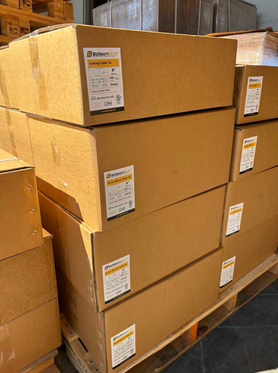 Labelled EdisonGrip cable-tie cartons on a warehouse pallet