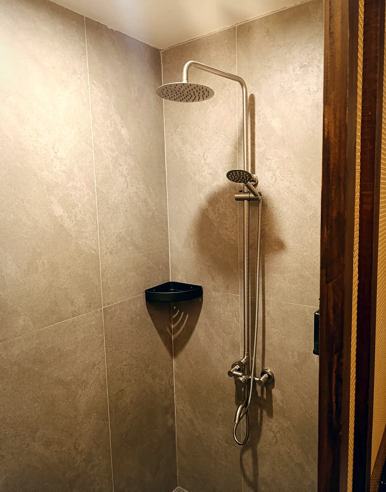 Rain shower in the Deluxe room's private bathroom