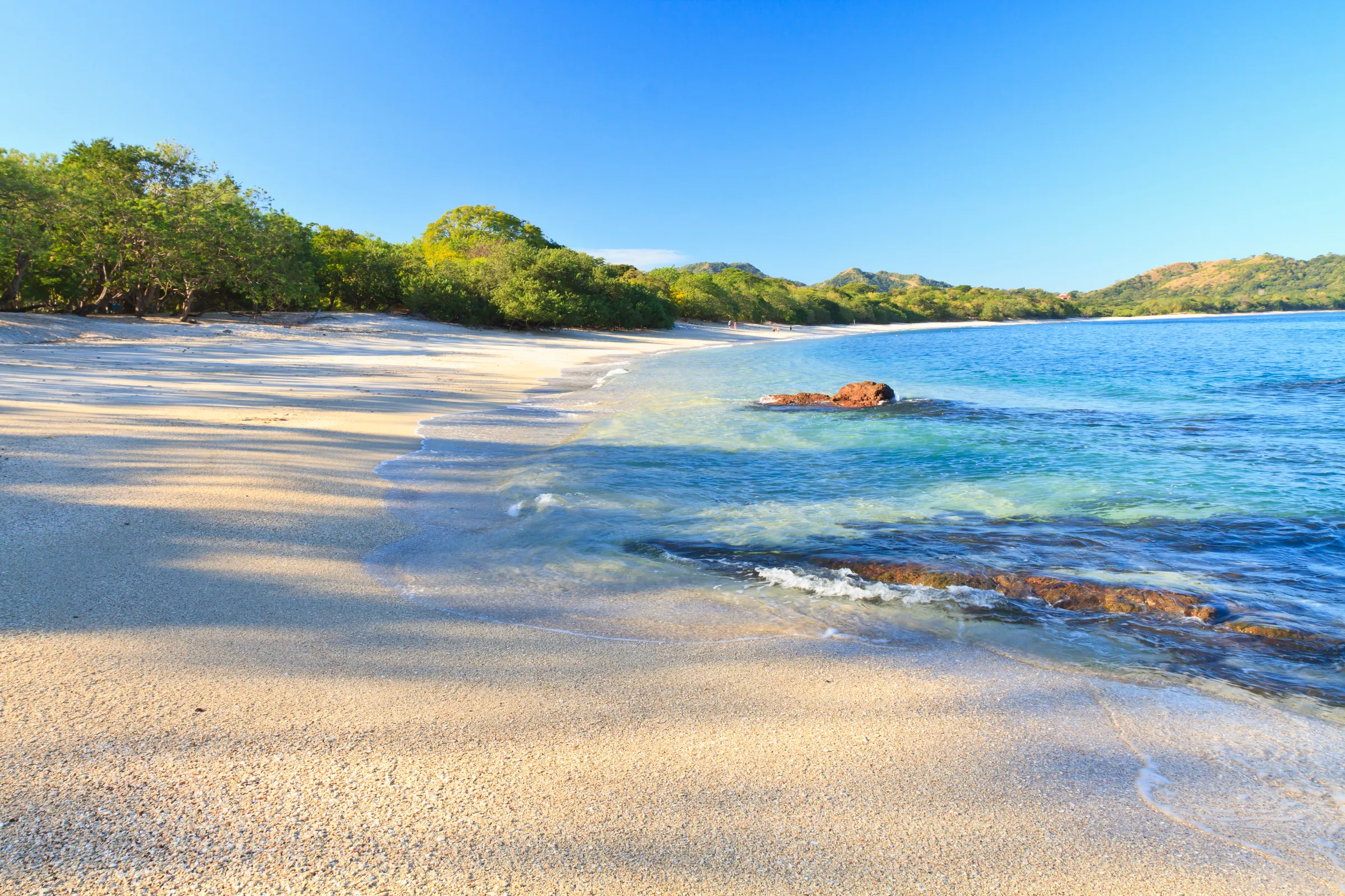 White sand beach beside a sheltered turquoise cove, Costa Rica