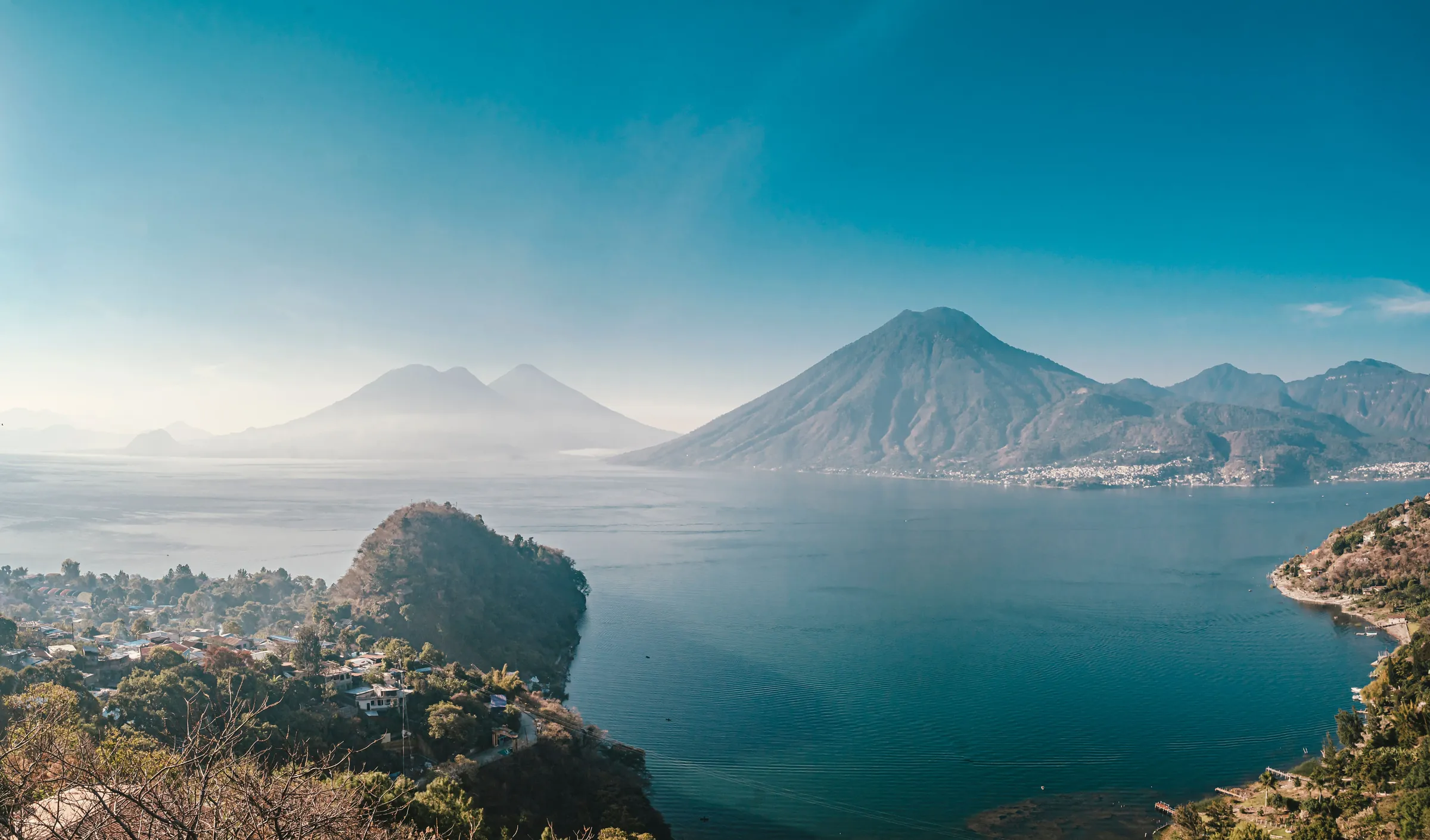 Aerial view of Lake Atitlán and its volcanoes
