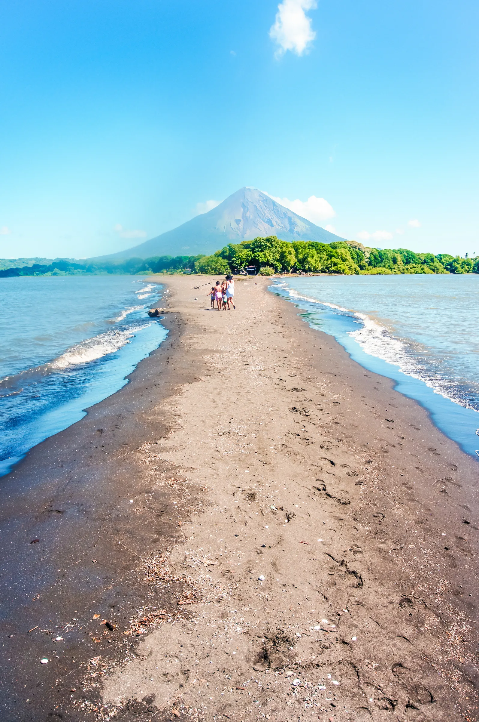 Narrow sandy beach on Ometepe with Concepción Volcano beyond
