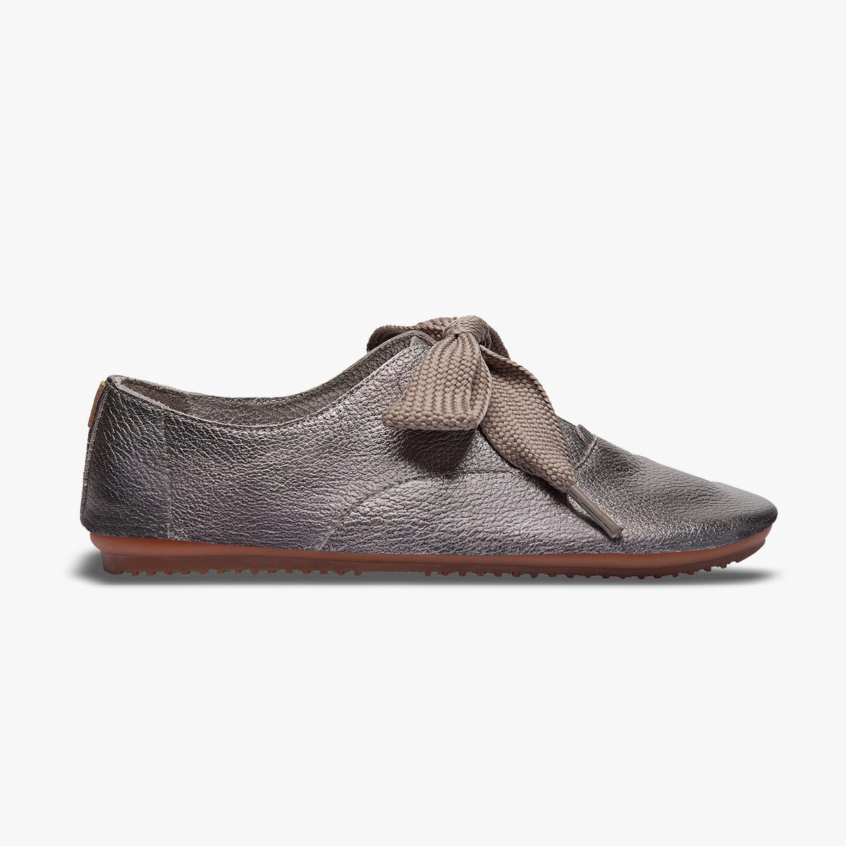 Woman wearing Stella flats in Pewter