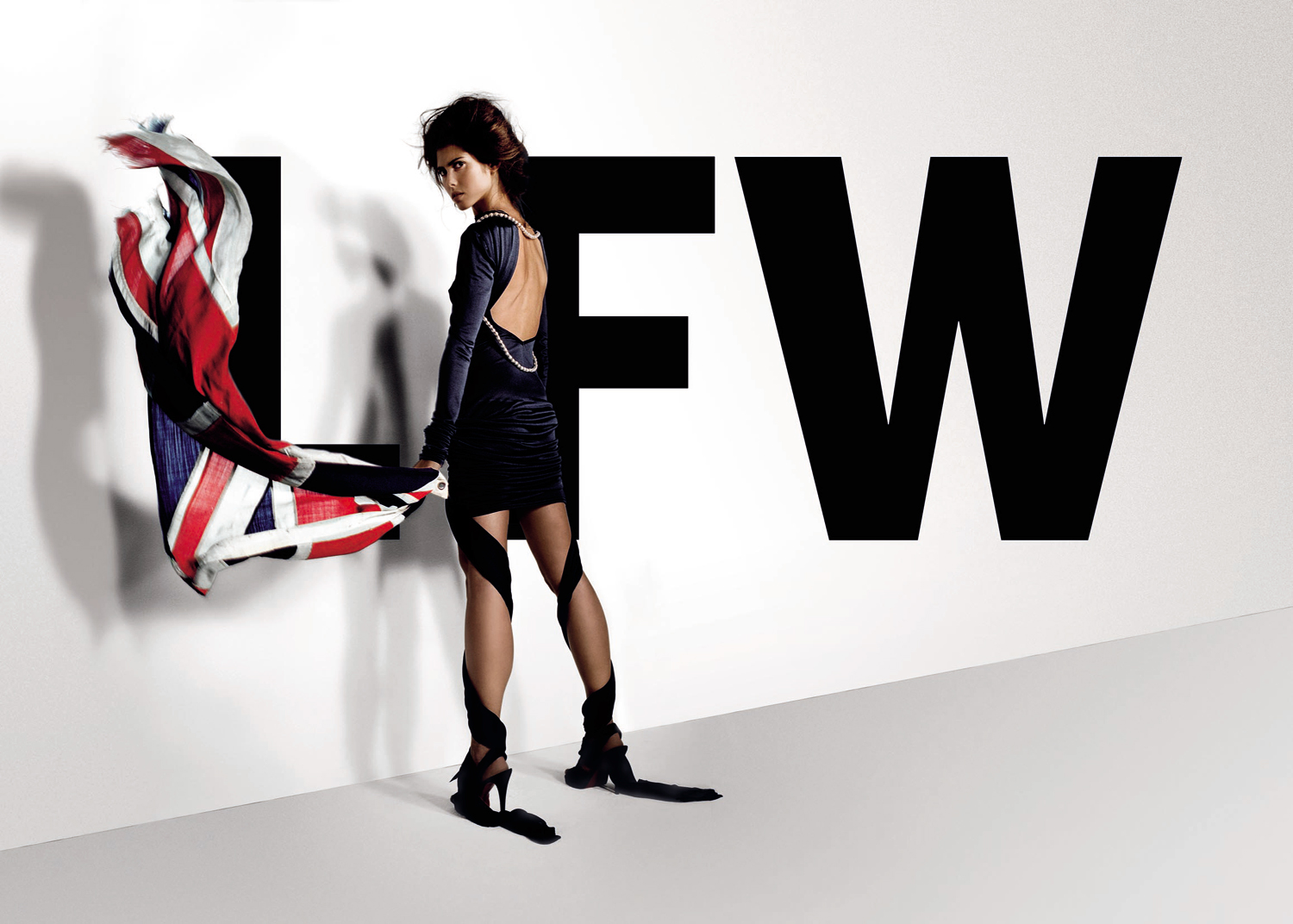 BODYAMR Collection 2006 — British Fashion Council London Fashion Week promotional campaign with navy open-back dress and Union Jack