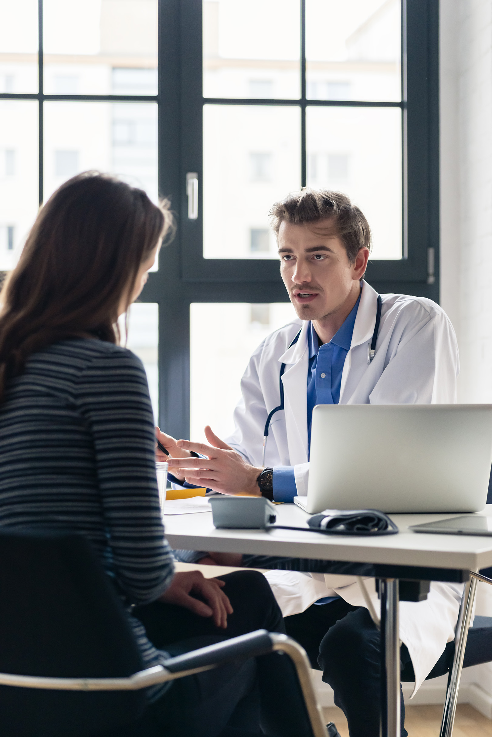 Doctor talking with a patient