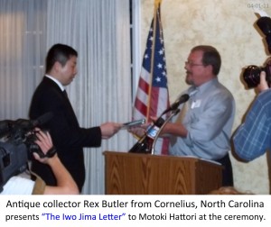 Rex Butler presents letter to Motoki Hattori