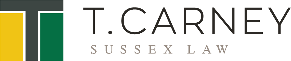 T. Carney Sussex Law logo