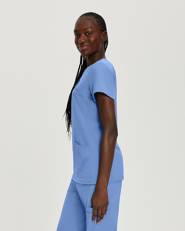 Photo of White Cross Scrubs Mock Wrap Solid Top Color Ceil Blue Side Vue 009
