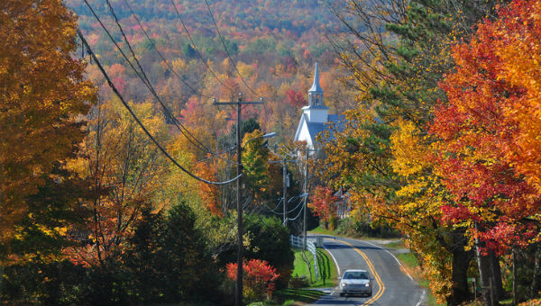 car on fall country road 600 x 340.jpg