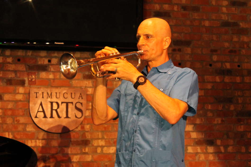 Benoit Glazer warms up on the stage of his home concert venue at the Timucua Arts Foundation in Orlando. Photo: Matthew Peddie, WMFE