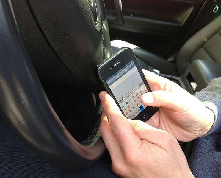 Image: Texting while driving via Intel Free Press/Wikimedia Commons