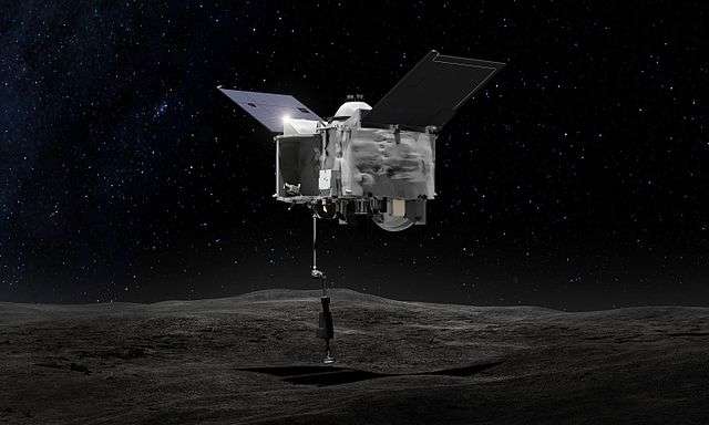 This artist’s concept shows OSIRIS-REx spacecraft contacting the asteroid Bennu with the Touch-And-Go Sample Arm Mechanism or TAGSAM. Photo: NASA