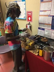 Gregory making volunteers breakfast