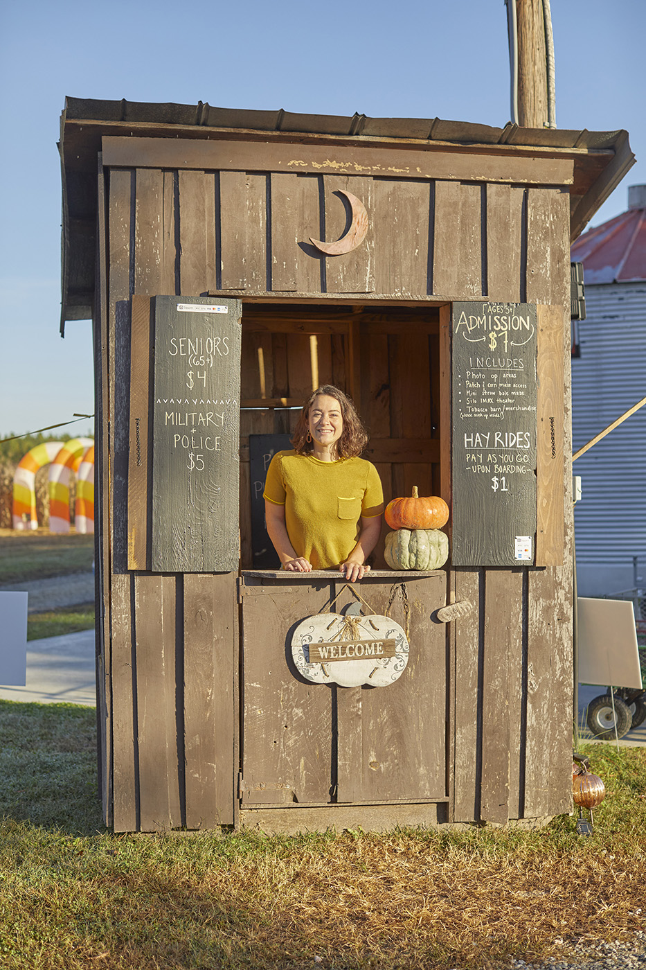 Ticket stand at Parrish Pumpkin patch in Lunenburg county, Virginia shot by Tyler Darden for Virginia Living magazine. Virginia Living Magazine, harvest, farm, lifestyle photographer, pumpkin harvest, 