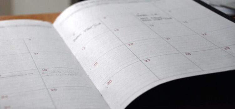 How to Plan Your Week Effectively: When to Schedule Tasks yearly calander in a notebook