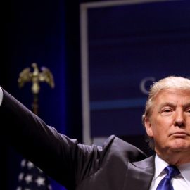 Donald Trump, who is facing a fraud trial, waving.