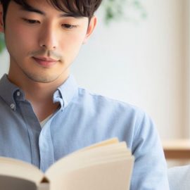A young man reading a book