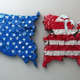 the United States torn in two pieces of blue on the left and red on the right illustrates solutions to political polarization