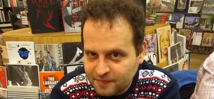 Author and doctor Adam Kay at a book signing in a bookstore