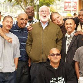 Greg Boyle and members of Homeboy Industries showing youth personal development