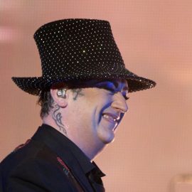 Boy George smiling on stage in Sydney illustrates the question, "Where is Boy George now?"