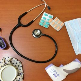 A table full of doctors' supplies that one might need if they had an autoimmune disease