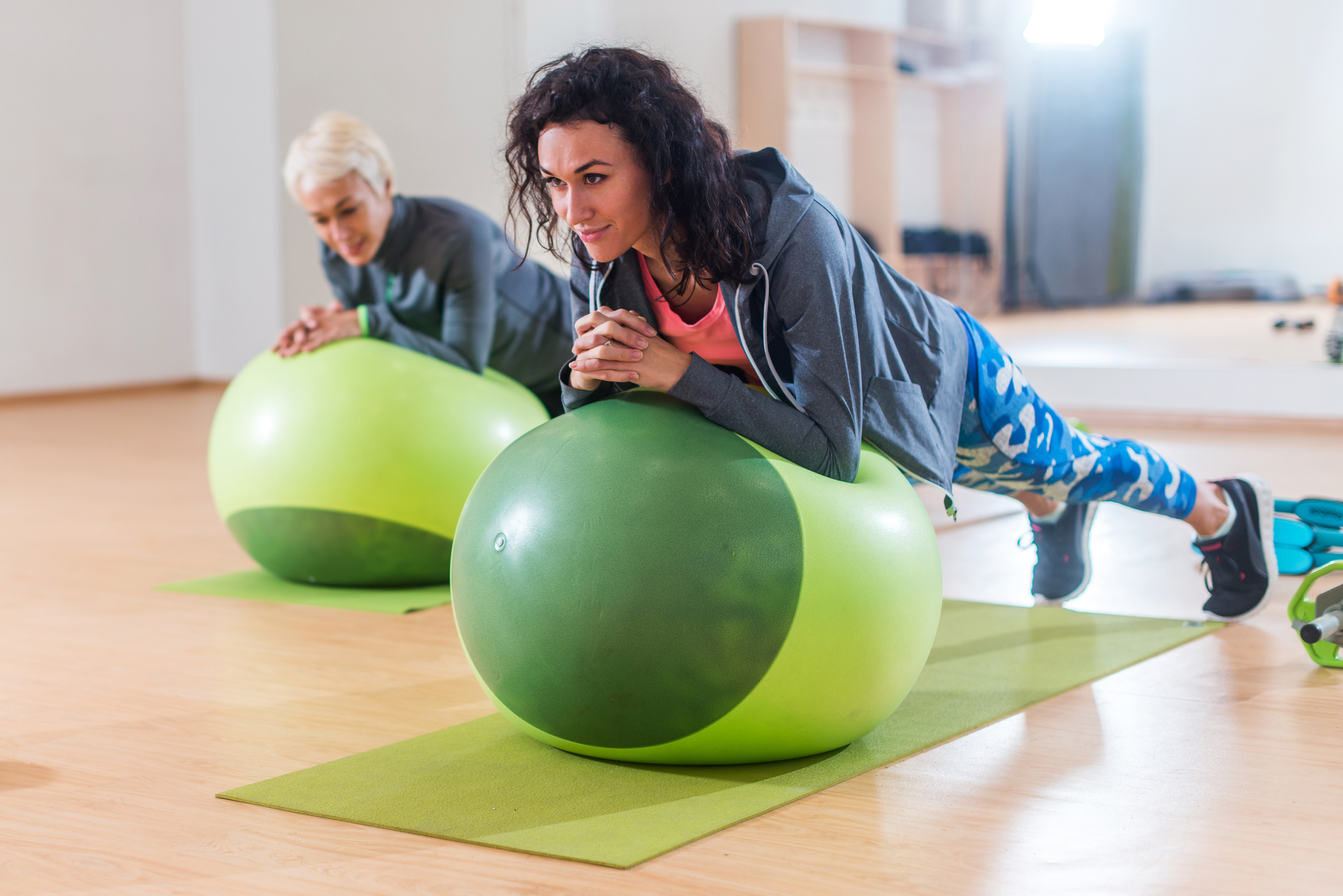 Spice up your workout with a stability ball and weights