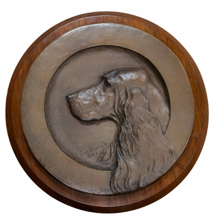 The Harrah bronze medallion donated to the AKC Museum of the Dog