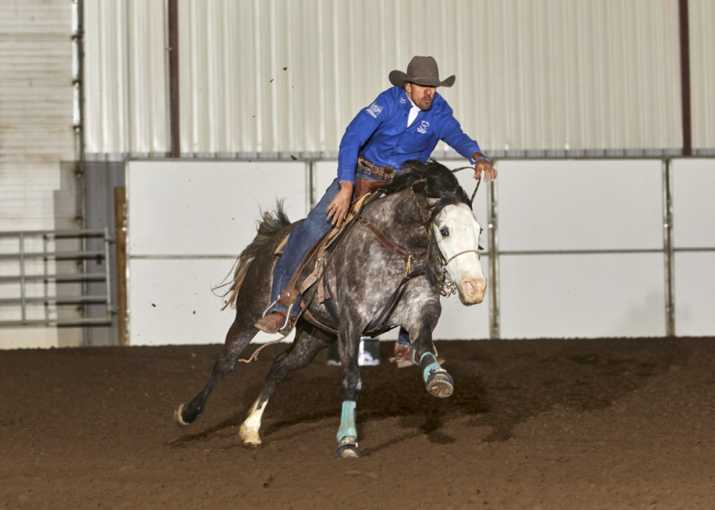 Andre Coelho and Fabulous JJ, owned by Smoke Creek Quarter Horses. Photo by Bill Lawless