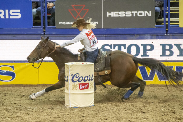 Wenda Johnson barrel racing in round 1 of the NFR