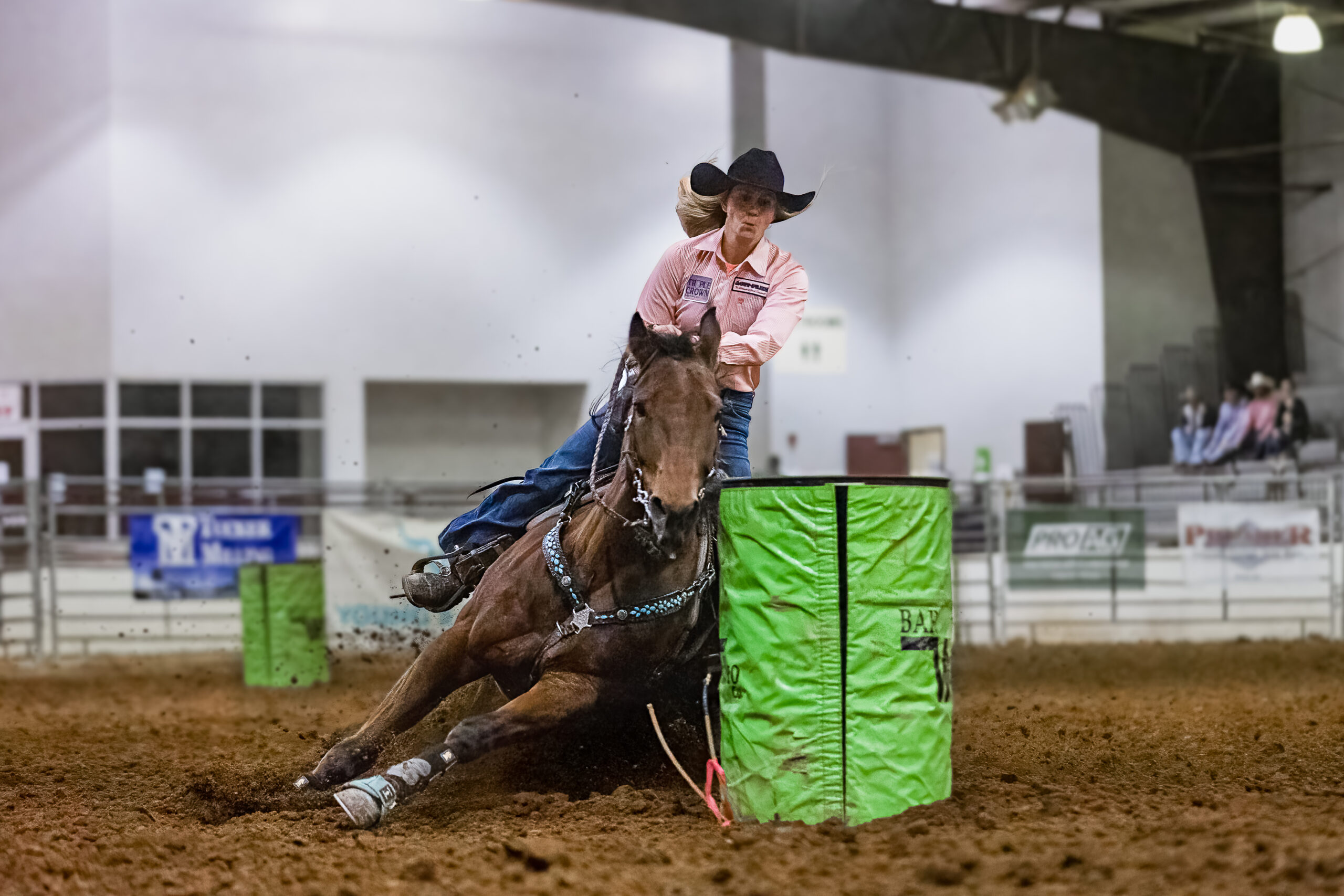 Nicole Love competes in the barrel racing on her horse, Josie.