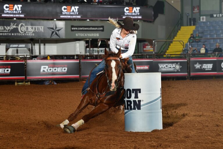 Laura Mote breaks the Cowtown Coliseum barrel racing arena record.