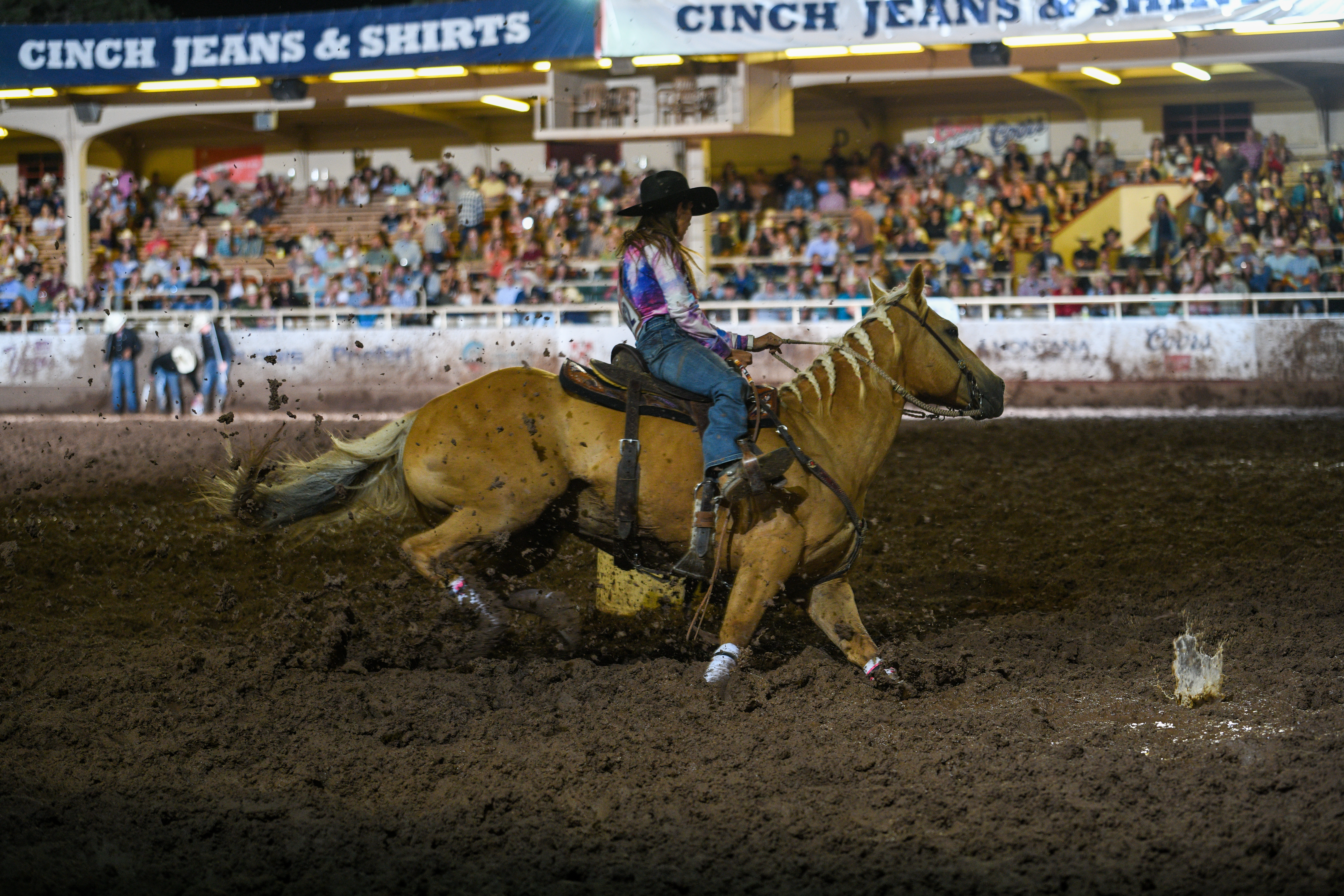 Jessica Routier barrel racing in the mud