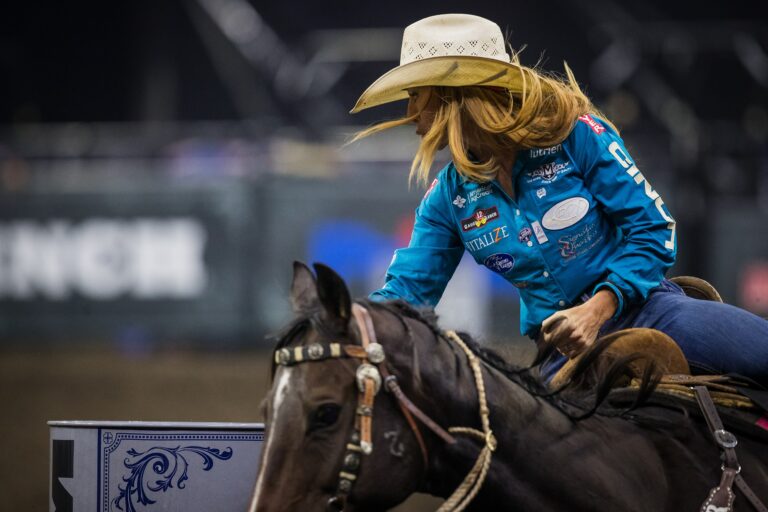 Emily Beisel and Liza barrel racing