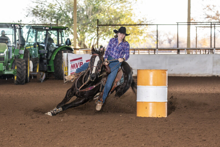 Linzie Lindsey and Fame Jo Walker barrel racing
